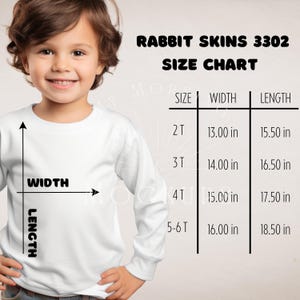 May include: A child wearing a white long-sleeved shirt. The image includes a size chart for Rabbit Skins 3302 shirts, showing width and length measurements in inches for sizes 2T to 5-6T.