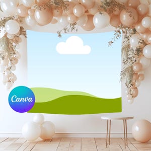 May include: A backdrop with a blue sky and green hills, adorned with a cloud. The scene is framed by a balloon arch in white and peach tones, with decorative sprigs. A small table and balloons are in the foreground. The Canva logo is visible.