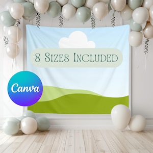 May include: A backdrop with a blue sky and green hills design, featuring the text "8 Sizes Included." A Canva logo is in the lower left corner. The backdrop is surrounded by white, sage green, and cream-colored balloons.