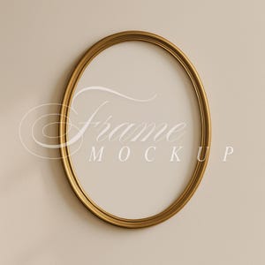 May include: Oval gold-colored frame mockup with the word "Frame" and "MOCKUP" in white script. The frame is set against a neutral, light beige background. The frame has a smooth, metallic finish.