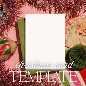 May include: A blank white rectangular greeting card template centered on a green envelope. The scene is surrounded by pink tinsel, a silver disco ball ornament, a vintage-style Santa Claus illustration, and a green honeycomb paper ornament.