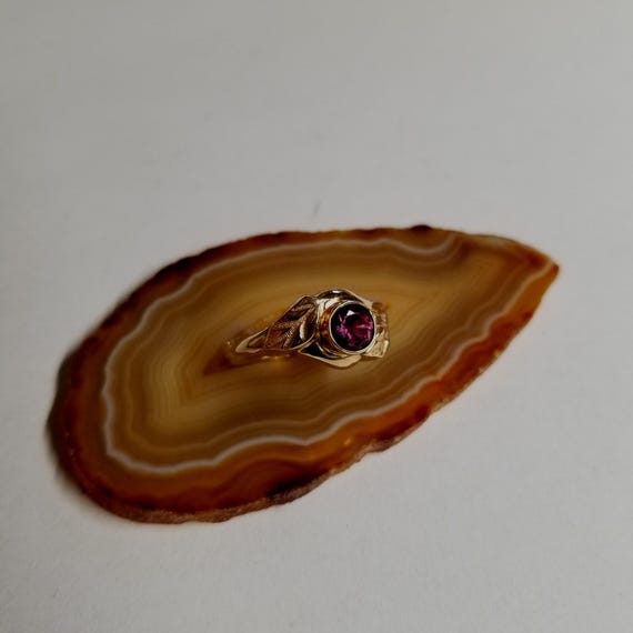 14kt yellow gold ring with purple sapphire