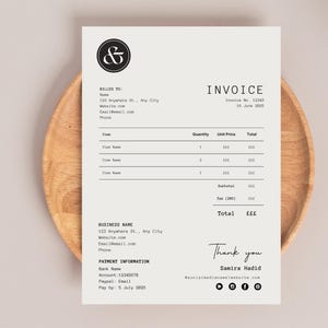 May include: A black and white invoice template with the text "Invoice" and the ampersand symbol. The invoice includes a section for billing information, a table for itemized costs, and a section for payment information. The invoice also includes the text "Thank you" and the name "Samira Hadid".