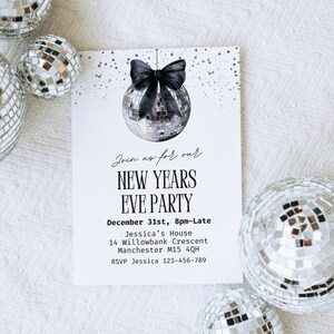 May include: A New Year's Eve party invitation with a disco ball illustration and a black bow. The invitation includes the event details: date, time, location, and RSVP information. Several disco balls surround the invitation.