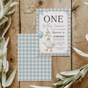 May include: A birthday invitation featuring a cartoon goose holding a balloon, wearing a party hat, and the text "ONE Silly Goose." The invitation is on a light blue gingham background with text that reads "Oscar's 1st Birthday."