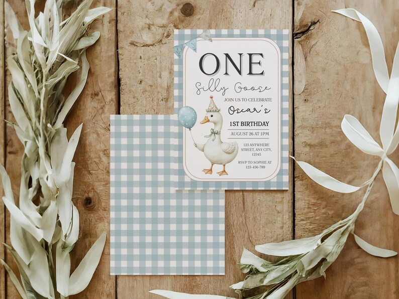 May include: A birthday invitation featuring a cartoon goose holding a balloon, wearing a party hat, and the text "ONE Silly Goose." The invitation is on a light blue gingham background with text that reads "Oscar's 1st Birthday."