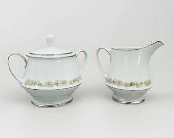 Juego de crema y azúcar Noritake Trilby Daisy Chain, blanco con margaritas y ribete platino, vintage.