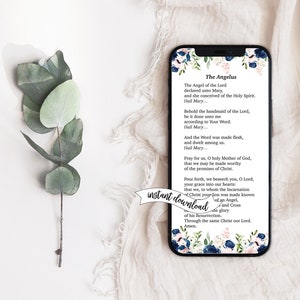 May include: A printable digital download of the Angelus prayer. The text is set against a floral background with blue and pink flowers. The text reads: "The Angel of the Lord declared unto Mary and she conceived of the Holy Spirit. Hail Mary... Behold the handmaid of the Lord, be it done unto me according to Your Word. Hail Mary... And the Word was made flesh, and dwelt among us. Hail Mary... Pray for us, O holy Mother of God, that we may be made worthy of the promises of Christ. Pour forth, we beseech you, O Lord, your grace into our hearts: that we, to whom the Incarnation of your Son was made known by the Angel's message, may by his Passion and Cross, through the same Christ our Lord. Amen."