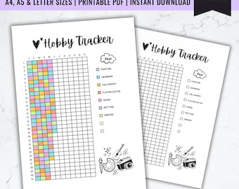 May include: Two printable hobby tracker pages with a colorful grid and a list of hobbies including painting, swimming, calligraphy, playing guitar, hiking, knitting, and dancing. The pages are designed for use with a bullet journal or planner.
