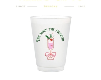 May include: A frosted plastic cup with the phrase "THE MORE THE MERRIER" in green script, surrounding a pink cocktail illustration. The cup also features the text "HELLO GIFTS" in gold.