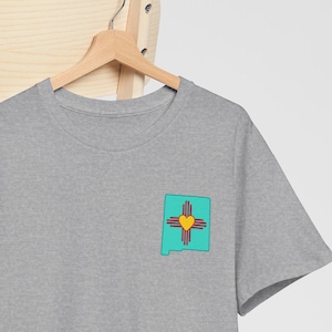New Mexico Zia Symbol T-Shirt, Land of Enchantment Tee, Southwest USA Gift Shirt, Unisex Cotton Top, Turquoise Design Apparel