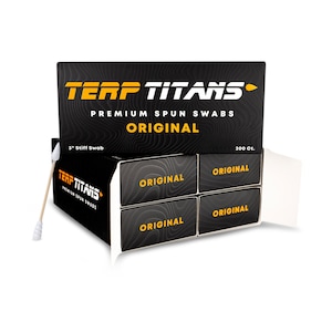 May include: A box of "TERP TITANS" premium spun swabs, "ORIGINAL" flavor. The box is black with gold lettering and a textured pattern. The box contains four smaller boxes labeled "ORIGINAL" and a single swab is visible.
