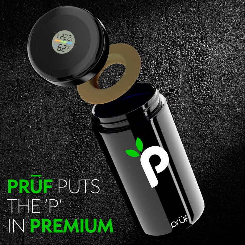 May include: Black container with a digital display on the lid, showing temperature and humidity readings. The container has a white "P" logo with green leaves and the text "PRUF PUTS THE 'P' IN PREMIUM" in white and green.