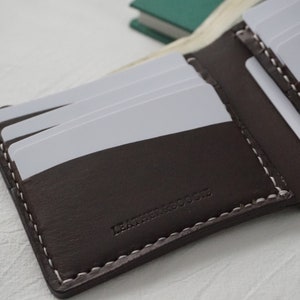 Cartera plegable con 11 bolsillos