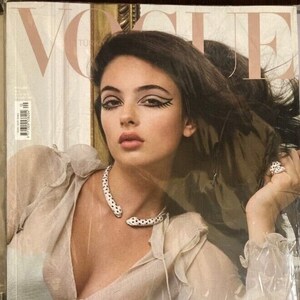 May include: A woman with dark hair and dramatic eye makeup is featured on the cover of Vogue Turkey. The cover features the text "RETRO IHTISAM" in a bold, sans-serif font.