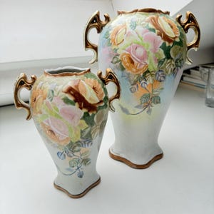 Pair of Antique Porcelain Vases by Reinhold Schlegelmilch – Hand-Painted Floral Design, Gilded Handles Tillowitz Germany, Early 20th Century