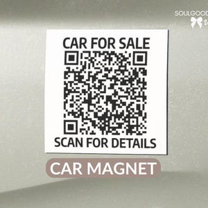 May include: A square white car magnet featuring a black QR code in the center. The text CAR FOR SALE is printed in black above the QR code, and the text SCAN FOR DETAILS is printed in black below the QR code. The magnet is displayed on a vehicle.