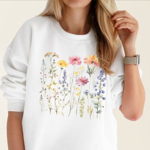 Cute oversized crewneck sweatshirt with wildflower pressed flowers print – floral gift for women, Printed in the USA, also available as a hoodie