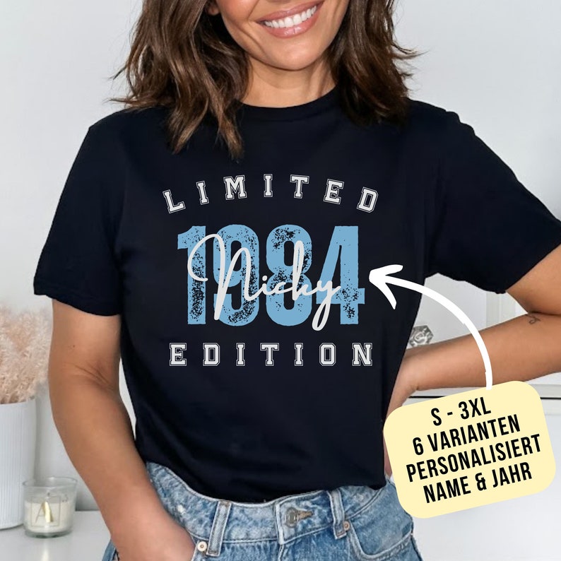 Smiling Woman wearing Tshirt with custom Name and year black with blue print in college style saying Limited Edition gift for Birthday