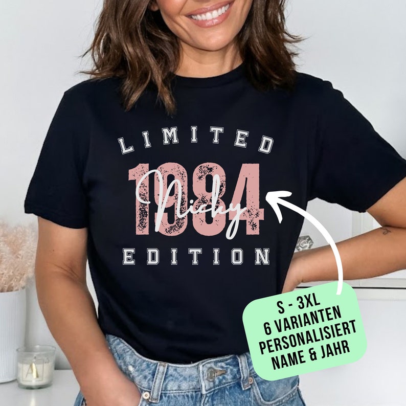 Smiling Woman wearing Tshirt with custom Name and year black with pink print in college style saying Limited Edition gift for Birthday