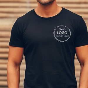 man with black shirt logo print in white on pocket