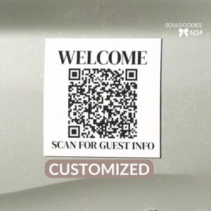 May include: A square white sign featuring the black text WELCOME at the top and SCAN FOR GUEST INFO at the bottom, with a large black and white QR code in the center. The top right corner displays the text SOULGOODIES USA with a small bow icon.