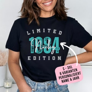 Smiling Woman wearing Tshirt with custom Name and year black with mint print in college style saying Limited Edition gift for Birthday