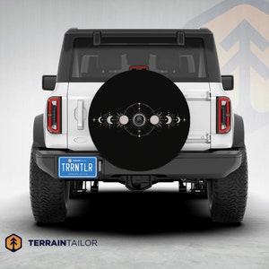 White Celestial Moon Phases Modern Tire Cover fits Jeeps, Broncos, SUVs, Campers, RVs | Free US Shipping | Includes Backup Camera Cutout