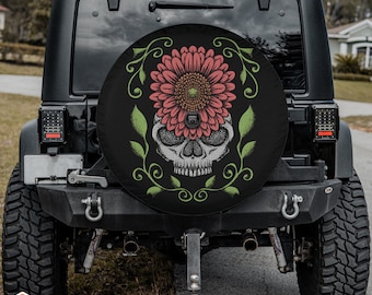 Stippled Skull & Prominent Flower Graphic Tire Cover fits Jeeps, Broncos, SUVs, Campers | Free US Shipping | Includes Backup Camera Cutout
