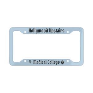 May include: A light blue license plate frame with the text "Hollywood Upstairs Medical College" and a medical symbol.