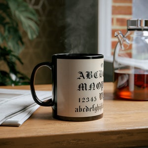 Old English calligraphy fonts from Draughtsman's Alphabets by Hermann Esser (1845–1908) 11oz Mug