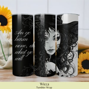 May include: A black and white Wicca tumbler wrap featuring a detailed illustration of a woman with long, flowing hair and a witch hat. The tumbler has the text "An ye harm none, do what ye will."