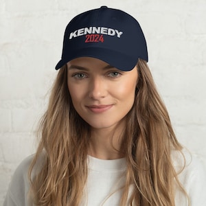 KENNEDY 2024 Hat Elevate your style with our Dad Hat featuring the bold KENNEDY 2024 design. Make a Supportive statement