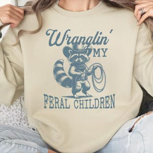 Retro Raccoon Sweatshirt, Wrangling Feral Children Tshirt, Raccoon Cowboy Shirt, Mom Vintage Tshirt, Alt Shirt for Dad, Vintage Vibe Tee