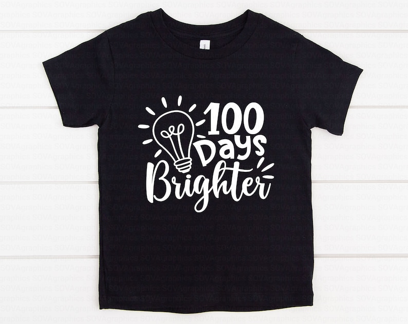May include: Black t-shirt with a white lightbulb graphic and the text "100 Days Brighter".