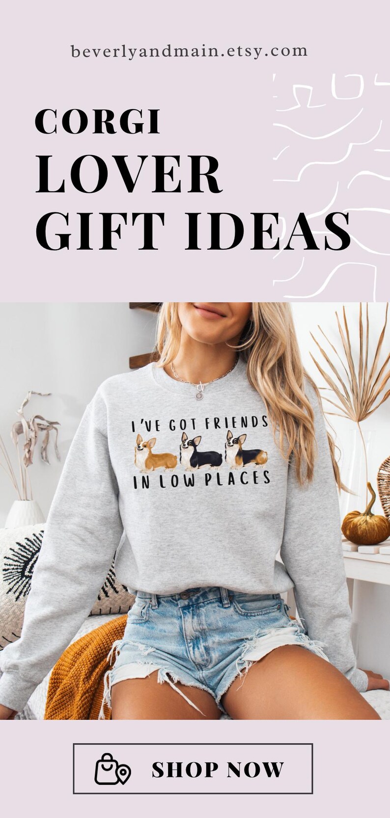 May include: A gray sweatshirt with a graphic of three corgis and the text "I've got friends in low places".