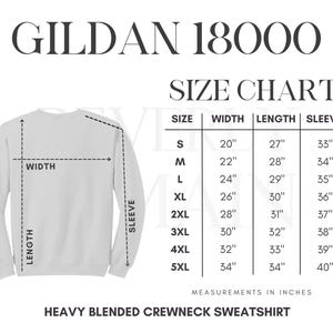 May include: Size chart for Gildan 18000 heavy blended crewneck sweatshirt. The chart shows measurements in inches for width, length, and sleeve length for sizes S through 5XL.