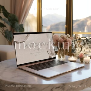 May include: A silver laptop with the text "WHITTEWOOD events" on the screen sits on a marble table. A bouquet of pink flowers in a gold vase and two lit candles are nearby. The words "INSTANT DOWNLOAD" are at the bottom.