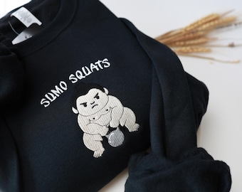 Sudadera bordada con sentadillas de sumo - Unisex