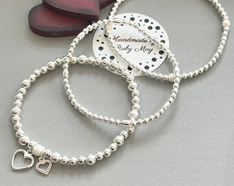 Set of 3 Sterling Silver Beaded Bracelets With Heart Charm