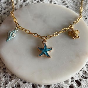 Shell, star and turtle charm necklace ~ beach jewelry ~ ocean necklace ~ boho necklace ~ chain necklace ~ gift for her