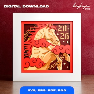 Op de afbeelding: Een gelaagd papierkunstwerk met een paardenontwerp in tinten beige, rood en bruin, geplaatst in een witte lijst. Het kunstwerk bevat rode wolken en de tekst "2026". De woorden "DIGITALE DOWNLOAD" en "SVG, EPS, PDF, PNG" zijn ook aanwezig.