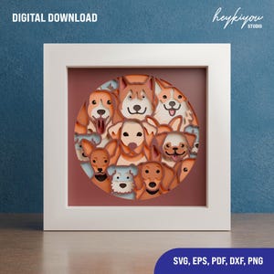 Könnte beinhalten: Ein digitaler Download eines mehrschichtigen Papierschnittdesigns mit einem Kreis aus verschiedenen Hunderassen mit unterschiedlichem Fellfarbton. Das Design befindet sich in einem weißen Rahmen vor blauem Hintergrund. Der Text "heykiyou STUDIO" befindet sich in der oberen rechten Ecke des Bildes. Der Text "SVG, EPS, PDF, DXF, PNG" befindet sich am unteren Rand des Bildes.