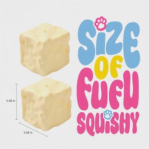 May include: Two off-white, cube-shaped objects with a textured surface, each measuring 7.82 cm on each side. The image includes the text "SIZE OF FUFU SQUISHY" in blue, yellow, and pink, with paw print icons.