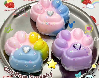 Juguete antiestrés sensorial de silicona con forma de pata de gato de colores variados