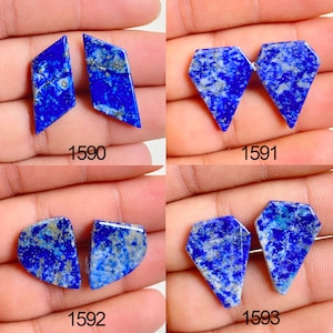 May include: Four pairs of blue lapis lazuli gemstone cabochons in various geometric shapes. Each pair is displayed against a light background. The gemstones have a deep blue color with flecks of gold and gray. Each pair is labeled with a number.
