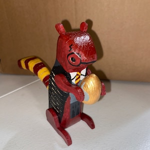Red and gold wizard squirrel