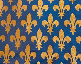 1 Meter blau-goldener metallischer Fleur-de-Lys-Gewandstoff