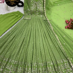 Heavy Chinnon Silk Material With Micro Cotton & Sequence And Embroidery Work Anarkali Gown