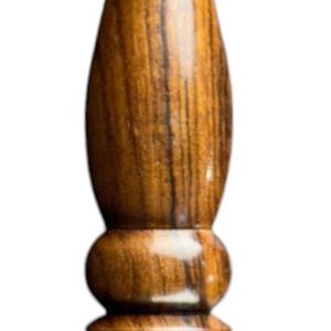 May include: A handcrafted wooden crochet hook with a polished finish. The hook features a curved head and a decorative handle with a series of rounded and stacked sections. The wood grain is visible.
